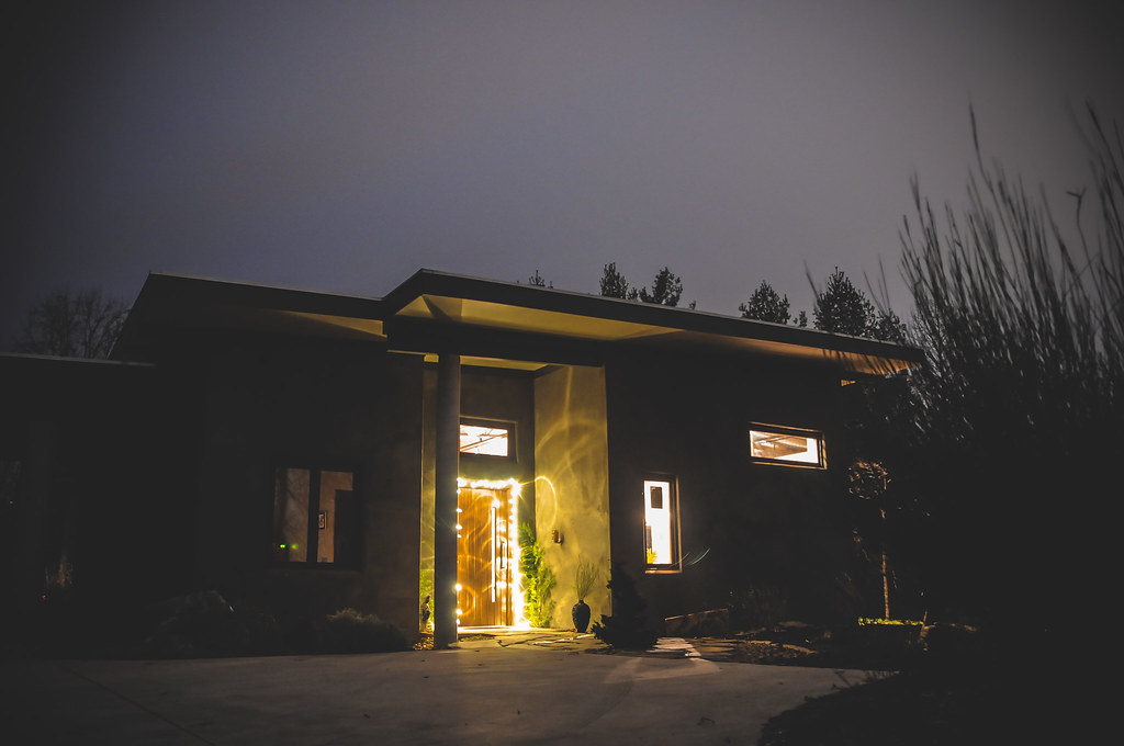 Modern home exterior with soft architectural lighting