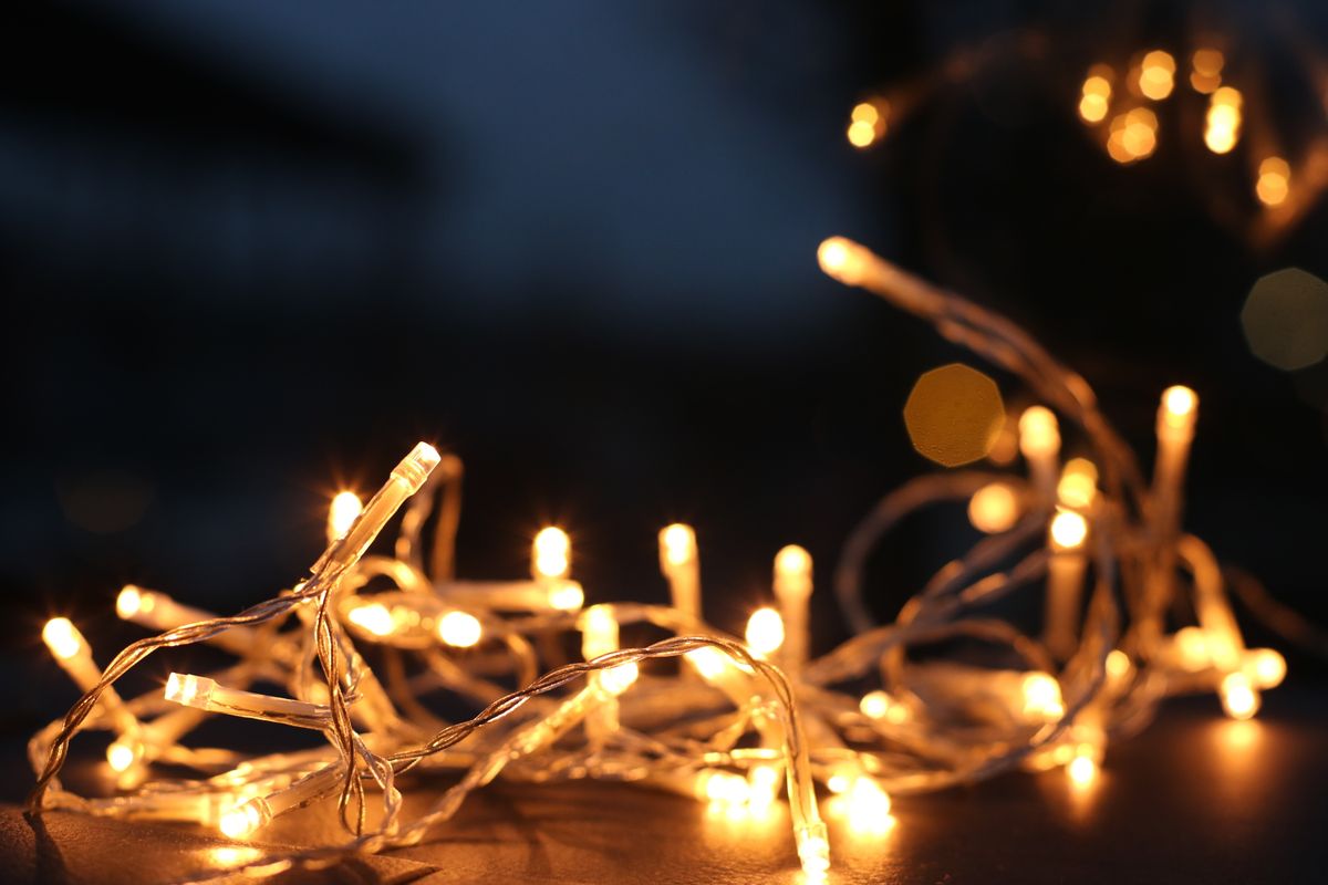 Warm white Christmas lights on a roofline
